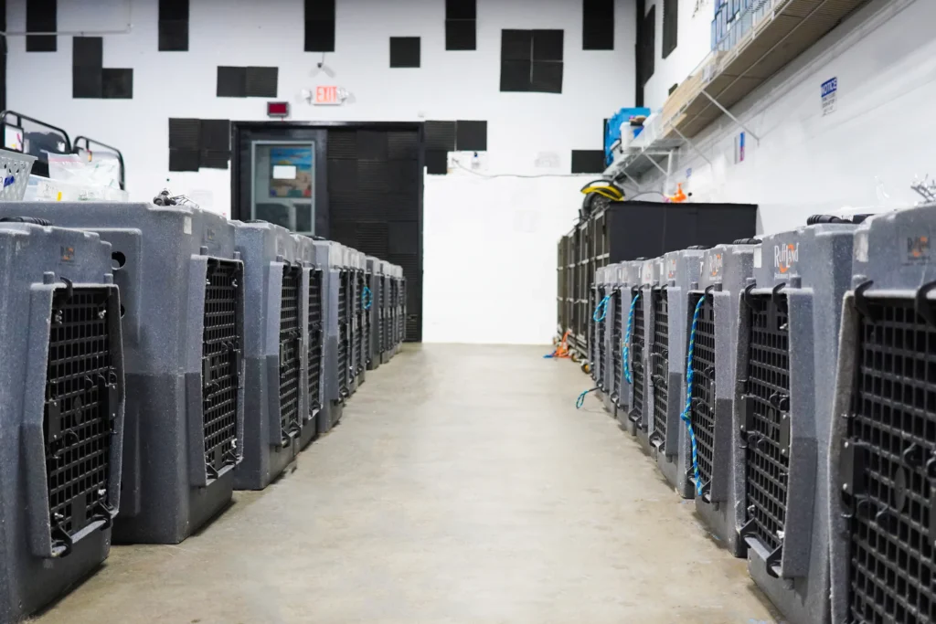 Our Commitment to Safety 3 Organized dog crates neatly stored in a dedicated area at K9 Mania, providing efficient and safe storage solutions for pet owners in Long Island, NY