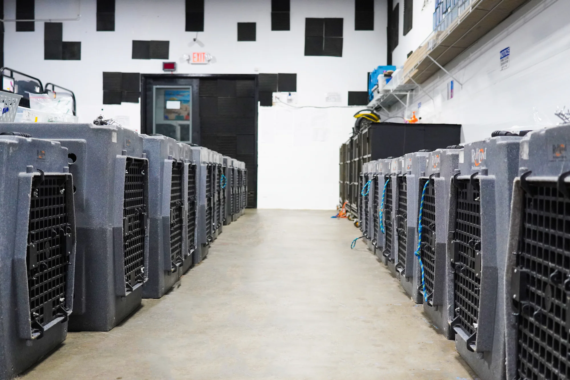 Our Certification 13 Dog crates and storage area at K9 Mania Dog Training facility in Suffolk County New York
